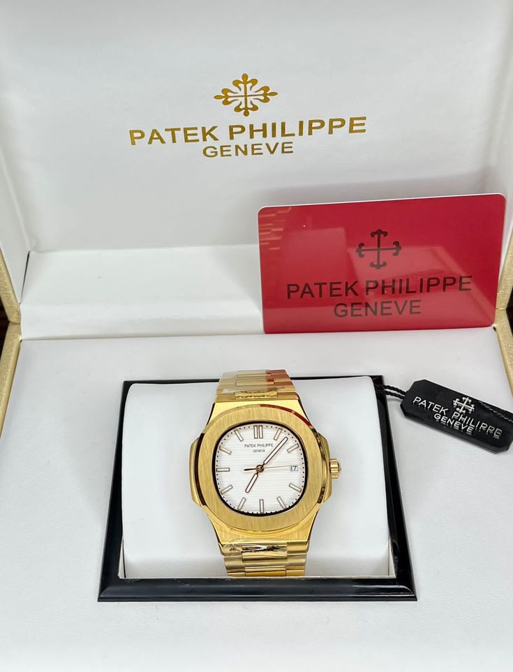 Patek Philippe Nautilus – Full Yellow Gold White Dial